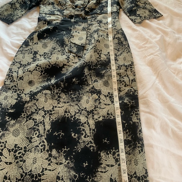 Brand: Alexander McQueen
Category: Dress. Colors: Black and Gold flowers - Picture 7 of 11